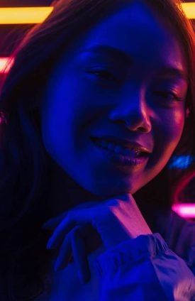 young woman with blue neon colors.jpg